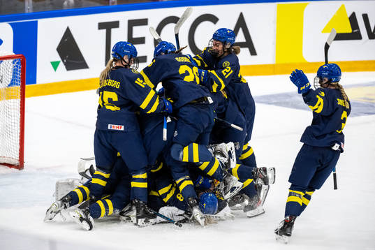 Players of Sweden celebrate
