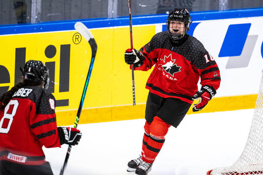 Eloise Caron of Canada celebrates scoring 4-0
