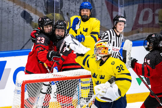 Caitlin Kraemer and Maya Serdachny of Canada celebrate 5-0