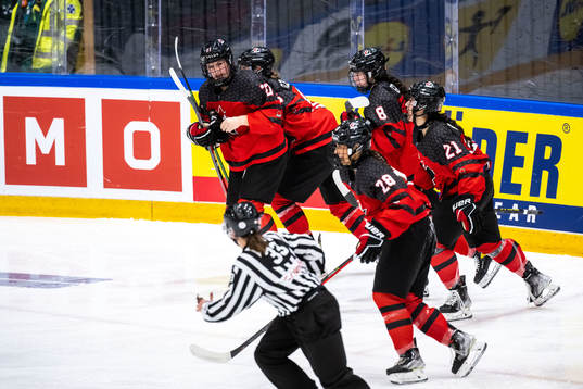 Players of Canada  celebrate 7-0