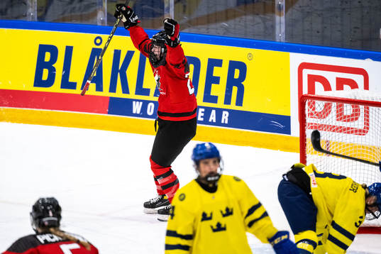 Abby Lunney of Canada celebrates scoringg 7-0