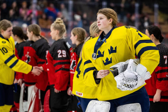 Goaltender Ida Henriksson of Sweden looks dejected