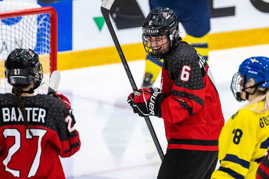 Charlotte Pickenhagen of Canada celebrate