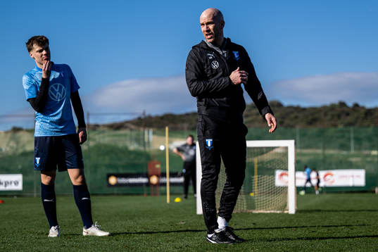 August Karlin och tränare Henrik Rydström