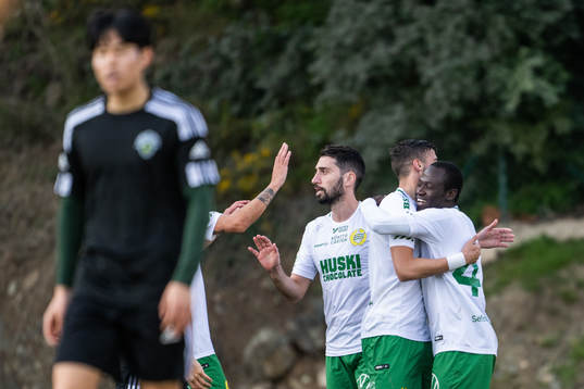 Nahir Besara and Saidou Alioum of Hammarby celebrate