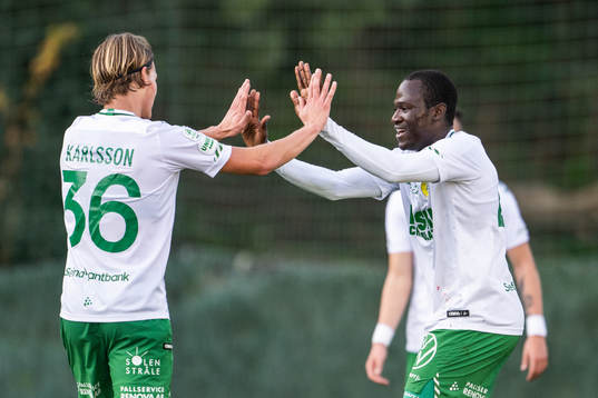 Marcus Karlsson and Saidou Alioum of Hammarby celebrate