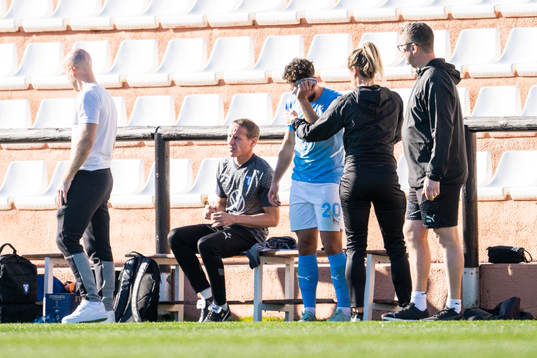 Moustafa Zeidan of Malmö FF is attended to by doctor