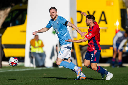 Lasse Nielsen of Malmö FF and Arriola Paul of Dallas
