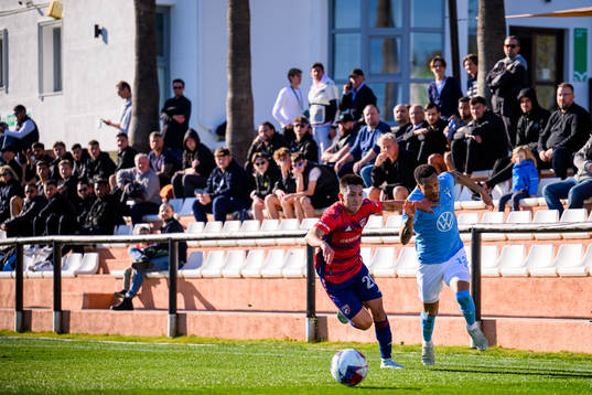 Velasco Alan of Dallas and Martin Olsson of Malmö FF
