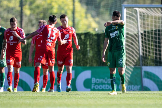 Players of Brann celebrate and Abdelrahman Saidi of