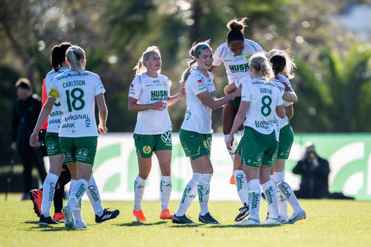 Madelen Janogy of Hammarby celebrates with teammates
