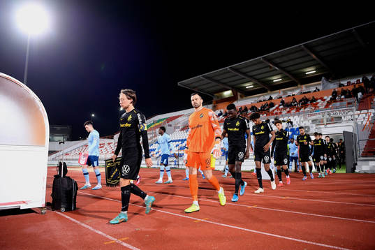 Players of AIK enter the pitch