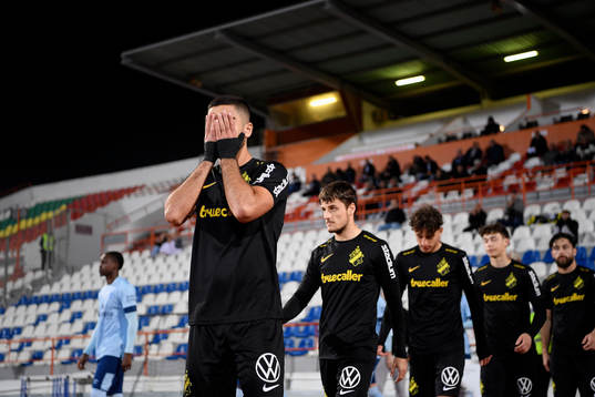 Players of AIK enter the pitch