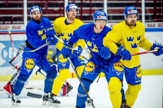 Dennis Rasmussen and Anton Lander of Sweden at a practice