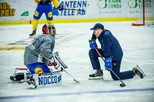 Goalkeeper Jhonas Enroth and goalie coach Stefan Ladhe of