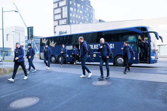 Players of Sweden arrive at the arena prior to a practice
