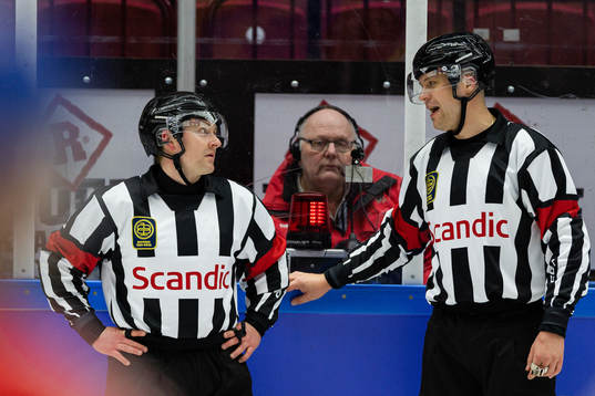Referees Lassi Heikkinen and Riku Brander