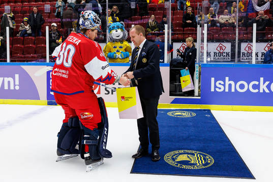 goaltender Ales Stezka of Czech Republic is awarded player
