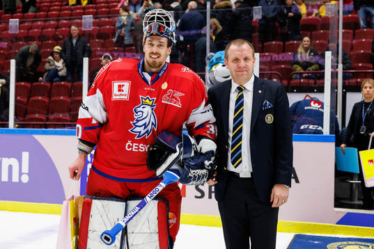 goaltender Ales Stezka of Czech Republic is awarded player