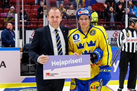 André Petersson of Sweden is awarded player of the game