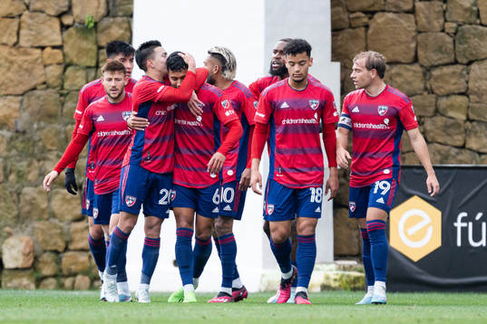 Players of Dallas celebrate the 1-0 goal by Arriola Paul