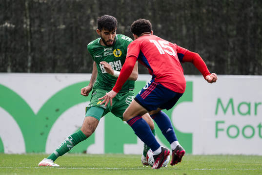 Montader Madjed of Hammarby and Parker Isaiah of Dallas