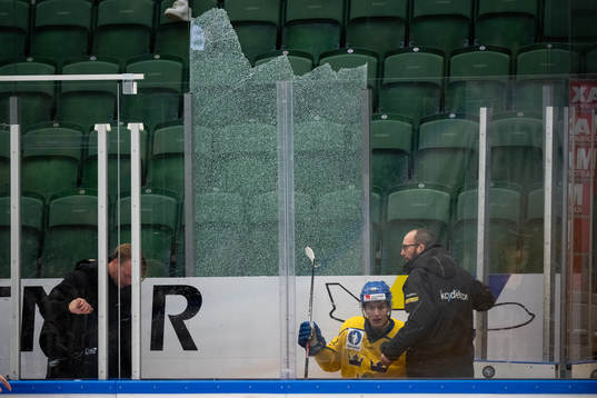 Crashed glass behind Erik Påhlsson of Sweden