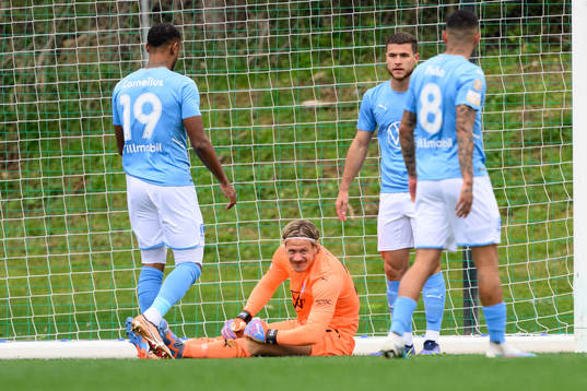 goalkeeper Johan Dahlin of Malmö FF in pain