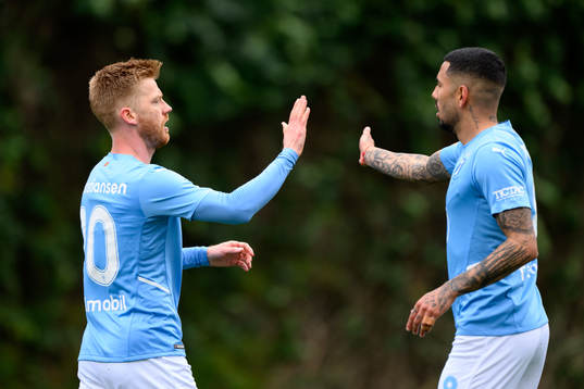 Anders Christiansen and Sergio Pena of Malmö FF celebrate