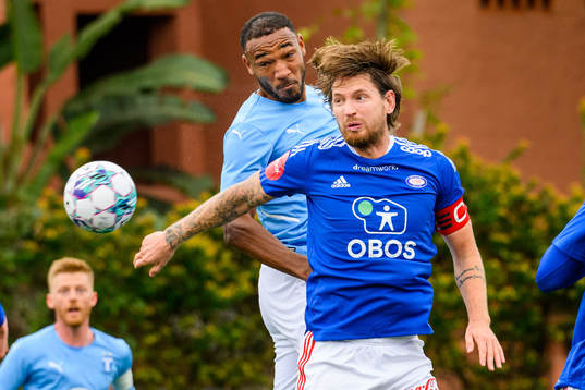 Stefan Strandberg of Vålerenga and Derek Cornelius of