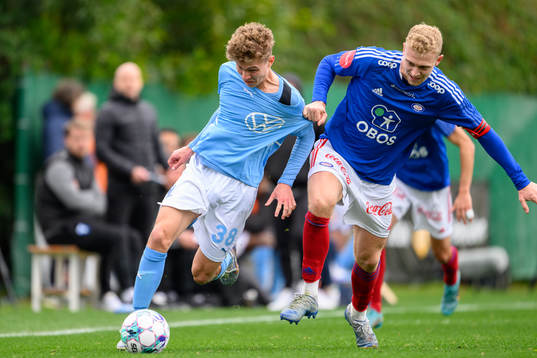 Hugo Bolin of Malmö FF and Henrik Bjordal of Vålerenga