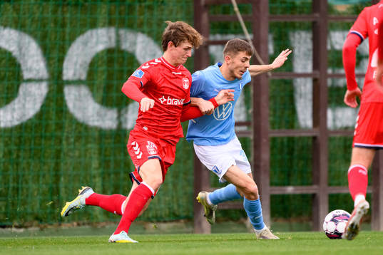 Peter Bjur of Aarhus and Patriot Sejdiu of Malmö FF