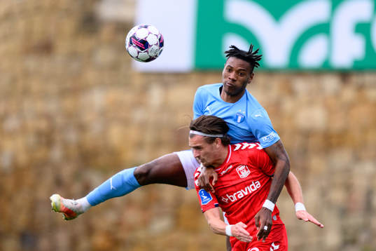 Samuel Kotto of Malmö FF and Hauso Haugen of Aarhus