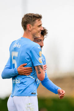 Søren Rieks celebrates with Moustafa Zeidan of Malmö FF