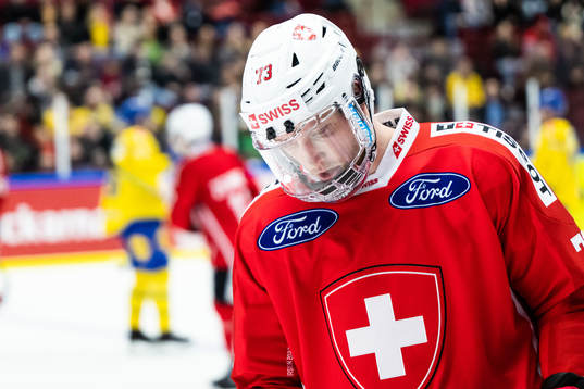 Mike Kunzle of Switzerland looks dejected