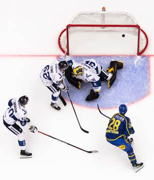 Anton Bengtsson of Sweden scores the 3-0 goal behind
