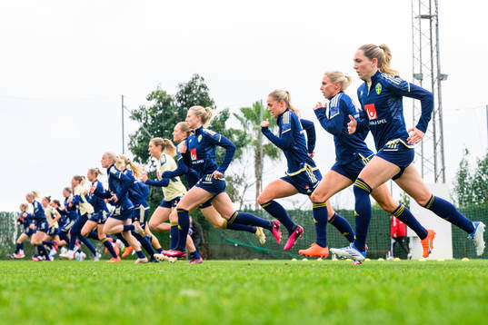 Players of the Swedish women's national football team warm