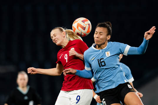 Karina Sævik of Norway and Yannel Correa of Uruguay