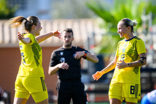 Fanny Andersson celebrates with Marika Bergman Lundin of
