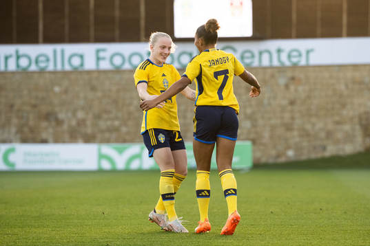 Madelen Janogy of Sweden celebrates with Anna Sandberg