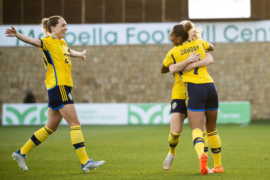 Madelen Janogy of Sweden celebrates with Elin Rubensson and