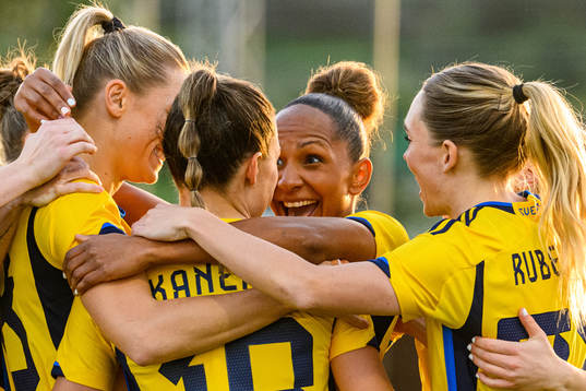 Johanna Rytting Kaneryd is hugged by Madelen Janogy of