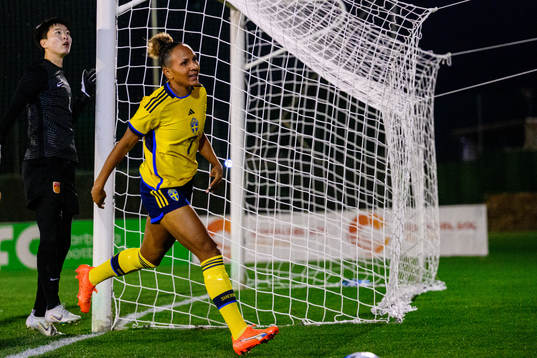 Madelen Janogy of Sweden and goalkeeper Zhu Yu of China