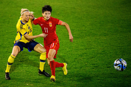Amanda Ilestedt of Sweden and Wang Shanshan of China