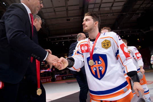 Tapparas Kristian Tanus celebrates with the medal