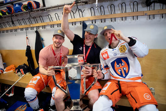 Players of Tappara celebrates with medal and trophy
