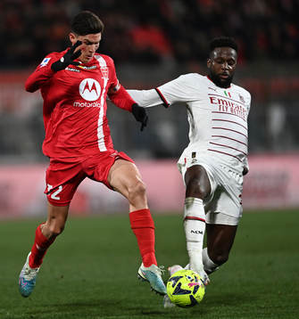 Matteo Pessina of Monza and Divock Origi of AC Milan