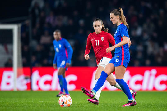 Guro Reiten of Norway and Sandie Toletti of France