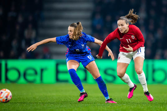 Sandie Toletti of France and Guro Reiten of Norway