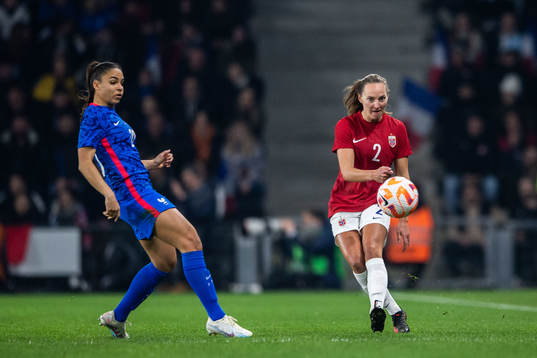 Delphine Cascarino of France and Marit Bratberg Lund of